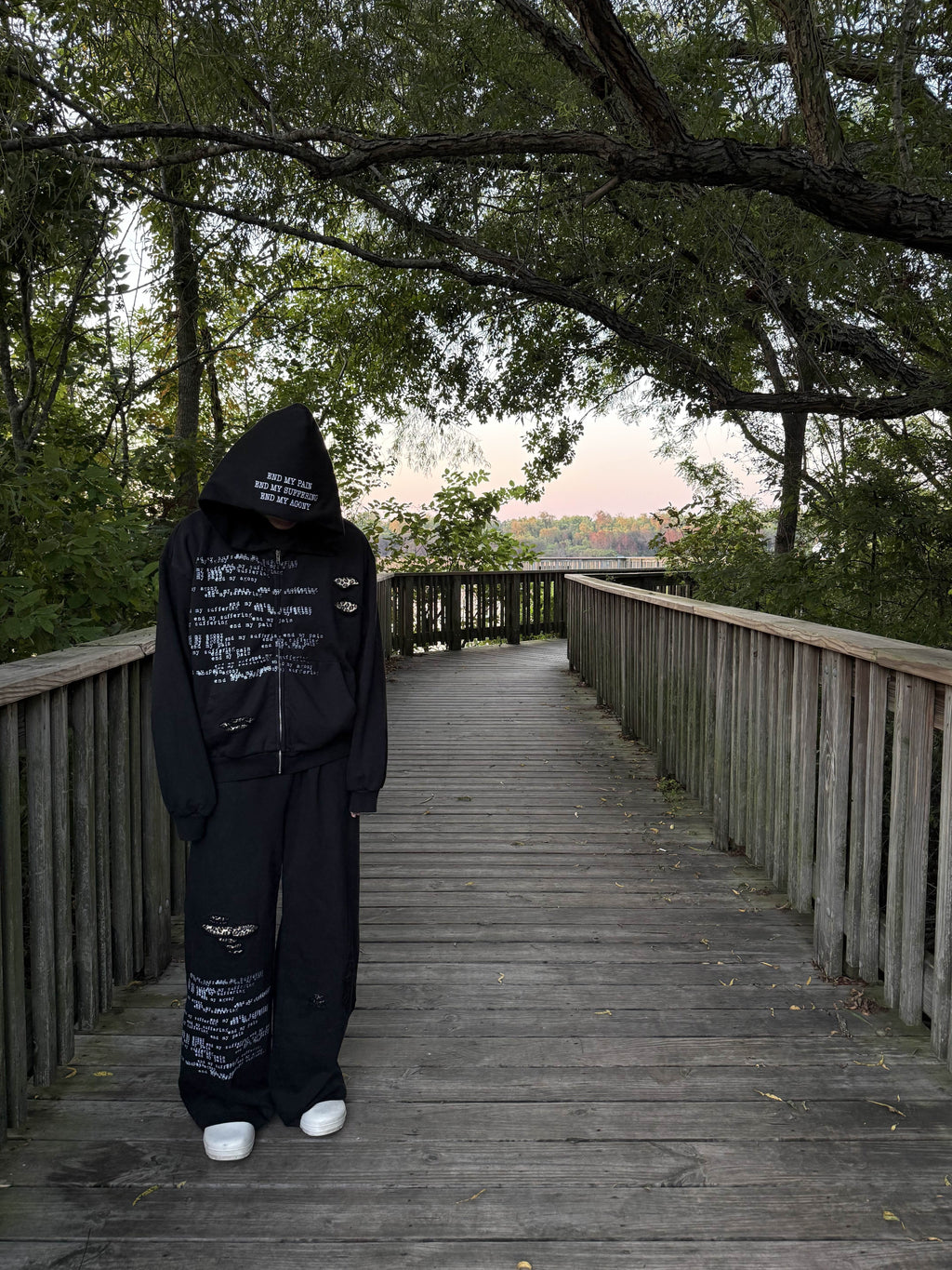 'the end" zip up black